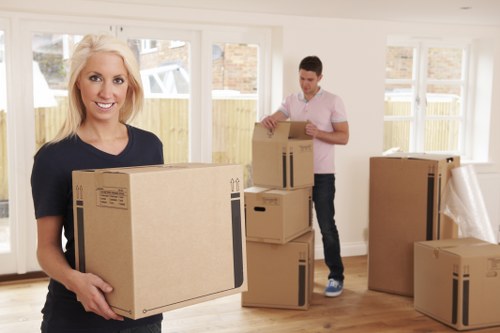 Office relocation planning in Chelsfield with moving boxes and desks