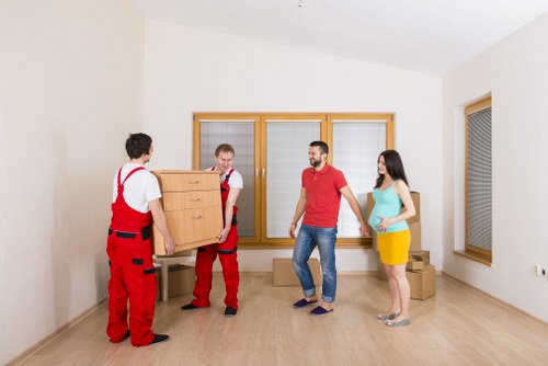 Boxes and household items organized in a storage space in Chelsfield