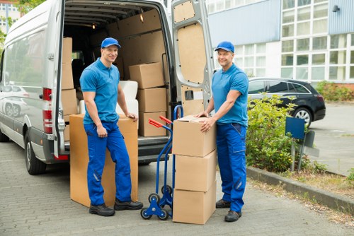 Unloading furniture during house removals in Chelsfield