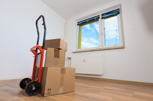 Professional team handling furniture during a small move in Chelsfield